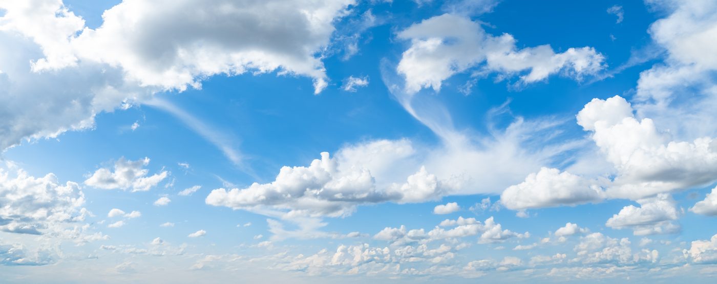 Wispy Cloud Blue Skies